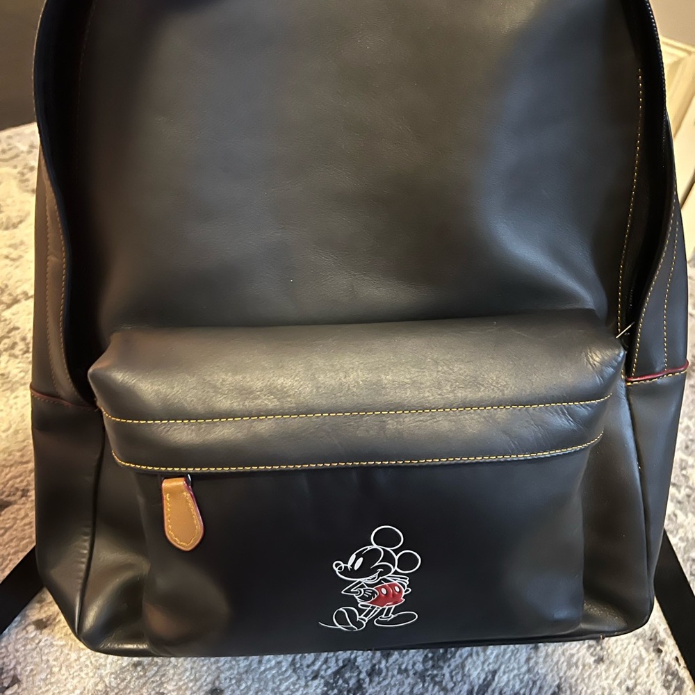 Disney x Coach glovetanned leather backpack in black